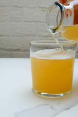 Fermented kombucha tea in a cup. Refreshing detox drink.