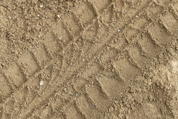 automobile track on the soil,