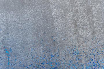 Blue paint on the surface texture and gray