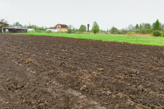 Dug up a field near the country house for planting vegetables or crops