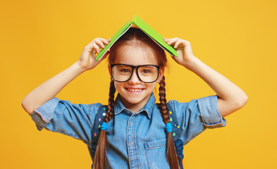 funny child school girl girl on yellow background