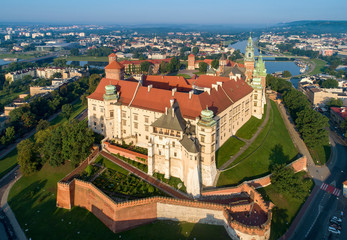 Fototapeta Historic royal Wawel castle and cathedral in Cracow, Poland.  Aerial view in sunrise light early in the morning obraz