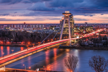 Fototapeta na wymiar Cityscape of Bratislava, Slovakia with New Bridge over Danube River at Sunrise