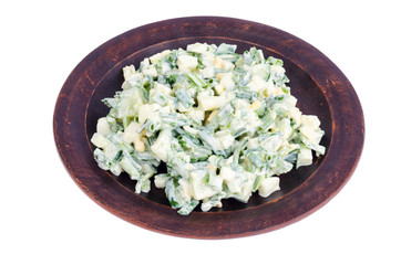 Light dietary egg salad with spring greens, yoghurt dressing.