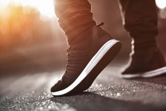 Close Up Of Man Sneakers On Street