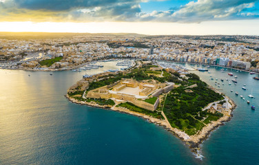 Aerial view of Fort Manoel. Manoel island, Gzira. Sunset time and clouds. Malta island - obrazy, fototapety, plakaty
