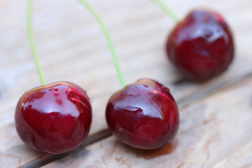 Close up of fresh cherry berries photographed in daylight conditions