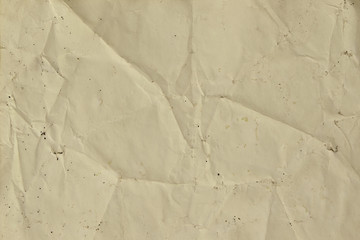 Old brown crumpled paper background texture