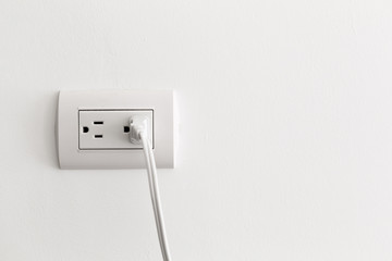 American electrical socket on white wall