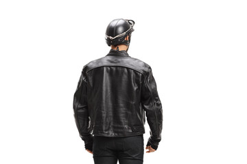 Rear view shot of a motorcyclist in a leather jacket and helmet