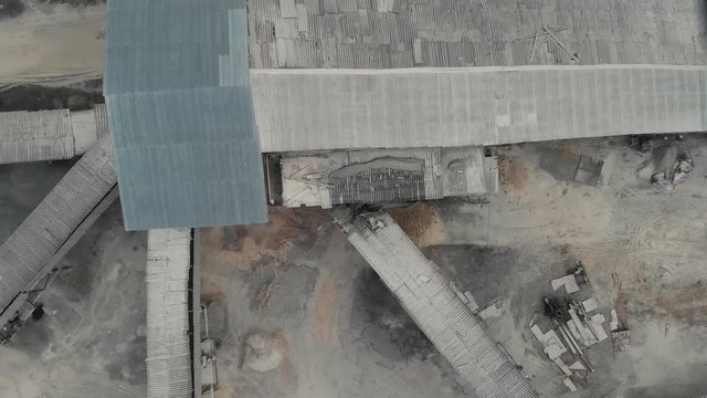 The chamber soars up above the stone crusher by the stone crusher. Top view of the stone crusher. Aerial video 4K