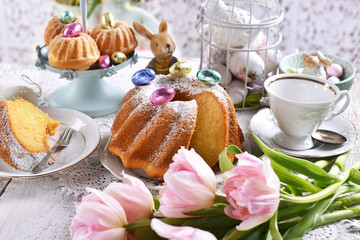 easter ring cake with  powdered sugar on festive table