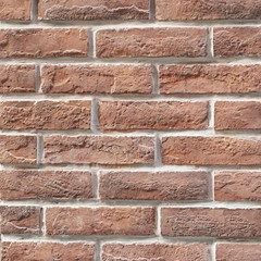 Fototapeta premium Brown brick wall as a background or texture