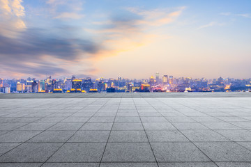 Empty square floor and beautiful city scenery in Hangzhou at night