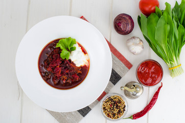 Vegetarian vegetable soup with beet without meat.