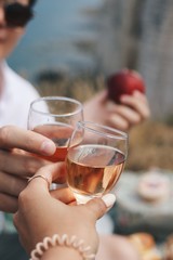 couple toasting with glasses of wine