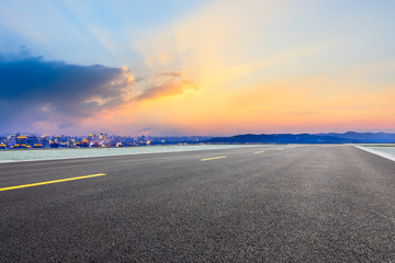 Fototapeta premium Asphalt highway passing through the city above in Hangzhou at sunset