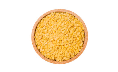 yellow lentils  in wooden bowl isolated on white background. nutrition. food ingredient.