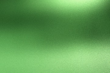 Abstract texture background, light shining on rough green metal wall