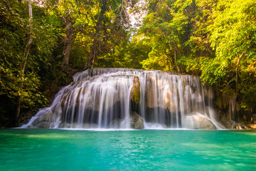 Fototapeta na wymiar Erawan Waterfall in National Park, Thailand,Blue emerald color waterfall
