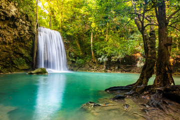 Fototapeta na wymiar Erawan Waterfall in National Park, Thailand,Blue emerald color waterfall