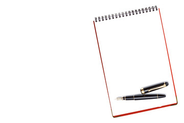 Blank notebook with pen on white background
