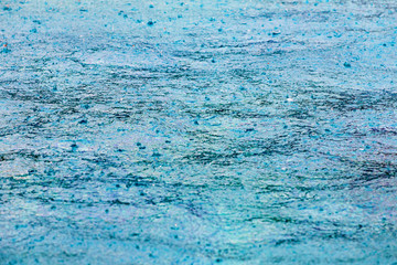 Hotel swimming pool with raining