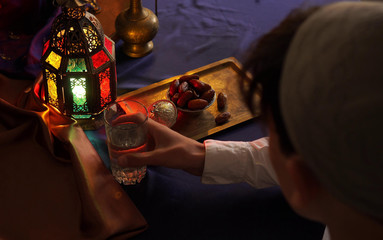 Meals are served before sunrise, called suhoor, and after sunset, called iftar, and eaten with family or with the local community. The holy month of Ramadan