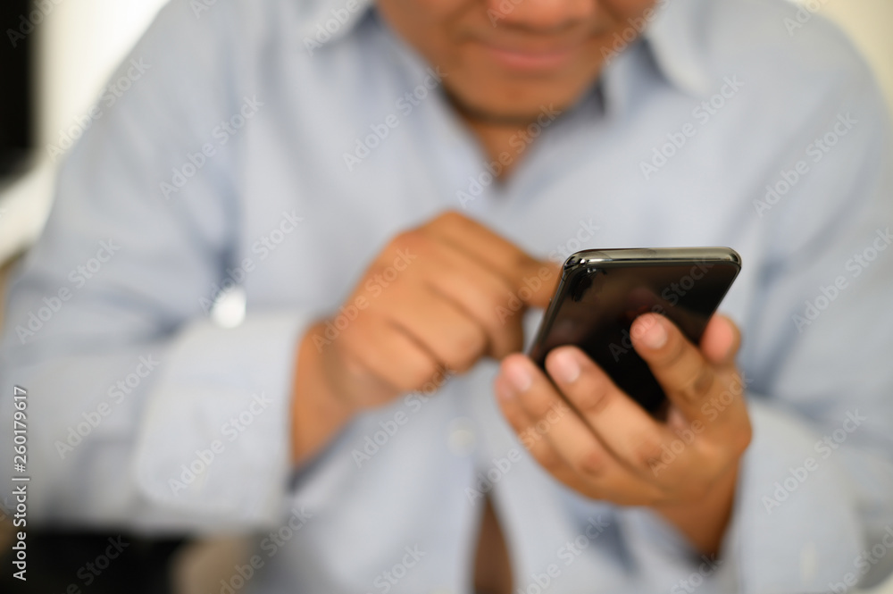 Poster manhands using a smartphone text work digital and communication concept