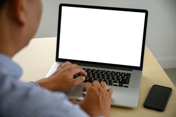 man working on his laptop with blank copy space Laptop with blank screen Mock up Blank screen computer