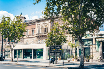 Fototapeta premium Traditional architecture of Sicily in Italy, historical street of Catania, facade of old buildings.