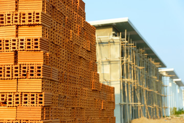 Red bricks for building in construction site.