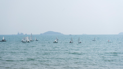 many small boat and blue water ocean