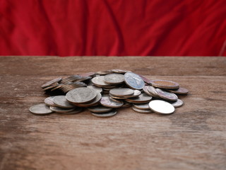 stacks of coins on red background