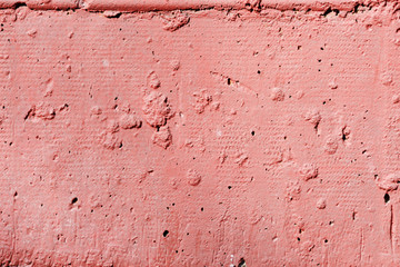 Pink color painted brick wall close up. Brick wall texture background