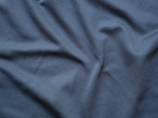 Fototapeta na wymiar black sportswear shirt background,silk shirt texture