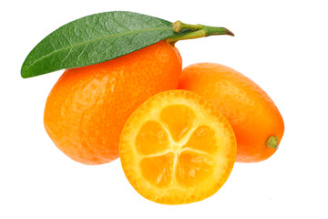 Cumquat or kumquat with slices and leaves isolated on white background