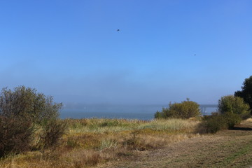 ghost bridge with landscape and marine fog