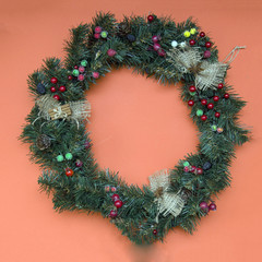 Fototapeta na wymiar Christmas wreath on a solid background