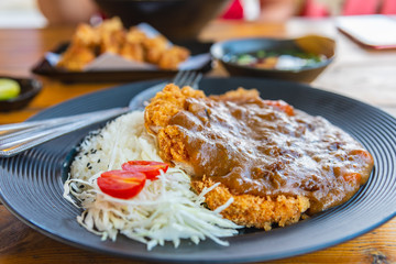 Japanese food tonkatsu curry or fried crispy pork curry served with Japanese rice.