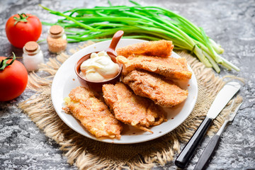 Pita bread fried in breadcrumbs with sour cream.