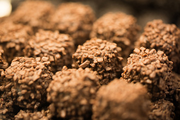 Close up / macro of chocolate pralines. Captured at eataly (shop with Italian specialities) in the Schrannenhalle, Munich.