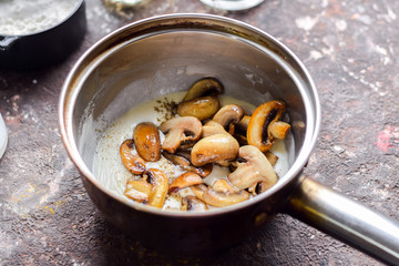 Champignons fried with spices in cream.