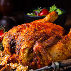 Grilled spicy chicken with barley groats and mushrooms