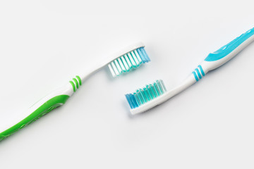 two new toothbrush on white background. concept