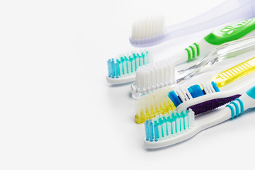 New different  toothbrushes on a white background
