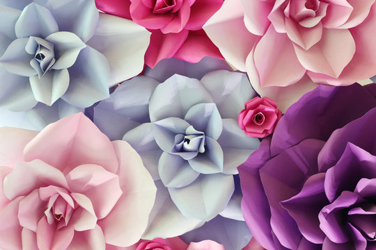 Colourful handmade of origami paper flower background.