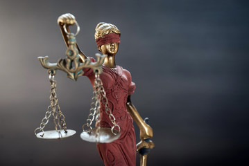 Law and Justice concept. Gray stone background, reflections on the floor, place for typography. Courtroom theme.