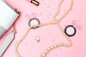 Feminine fashion  accessories on pink background. Flat lay