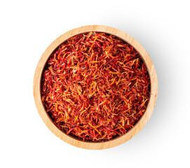 Fototapeta premium safflower in wood bowl on white background. top view